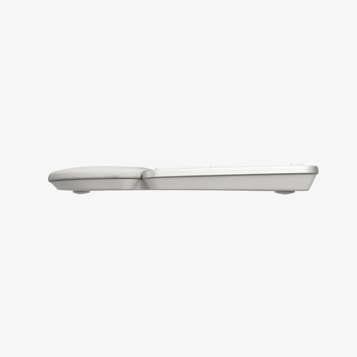 Side profile of Macally ergonomic keyboard highlighting slim design and rubber grip feet