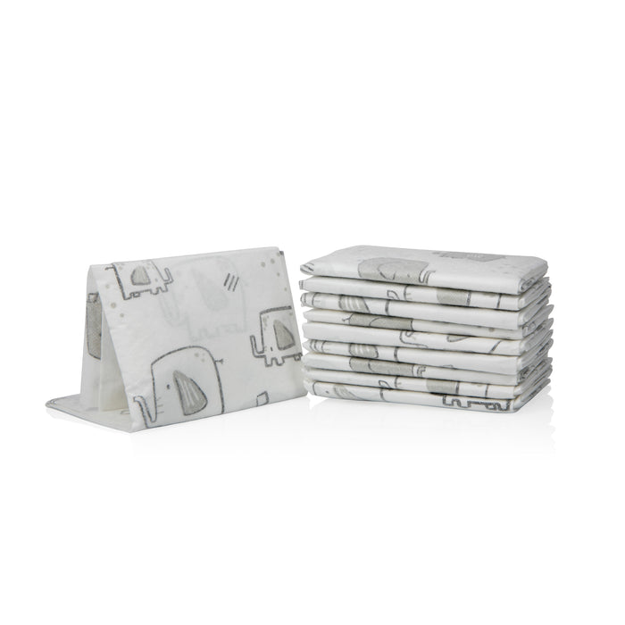 A stack of Dr. Talbot’s Disposable Changing Pads (10 Pack) is arranged next to one unfolded pad displayed like a soft baby changing pad, all set against a white background.