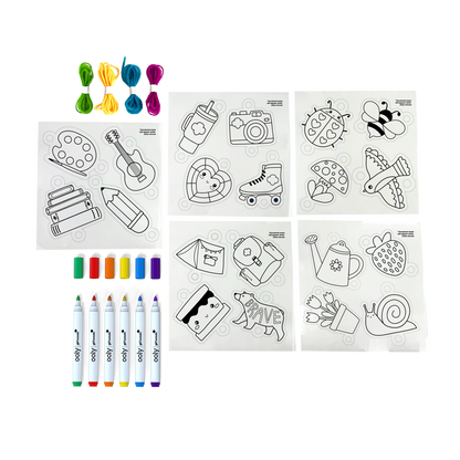 Contents of OOLY x Girl Scouts DIY Shrink Art Bracelet Kit including shrink charms, markers and cords.