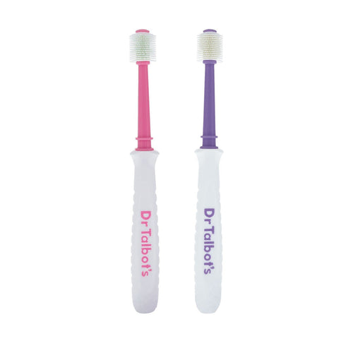 Dr. Talbot's Toddler 360° Toothbrush set includes two brushes with white handles, one with a pink neck and one purple. Both feature round, soft bristles and the Dr. Talbot's logo on the handle.