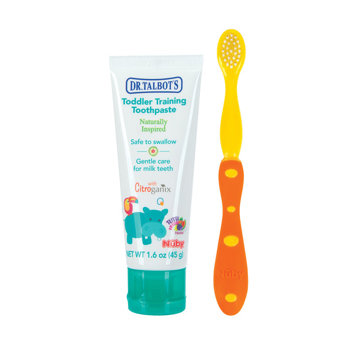 A Dr. Talbot's Toddler Toothbrush and Toothpaste Set, featuring a blue hippo illustration, includes an orange and yellow training toothbrush and fluoride-free, non-toxic toothpaste made for young children.