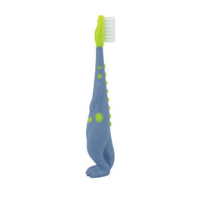 Dr. Talbot's Toddler Training Toothbrush with Toothpaste features a blue dinosaur shape with green accents and white bristles, standing upright—ideal for little ones learning to brush with fluoride-free toothpaste.